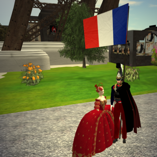 waving La Tricolore on Bastille Day